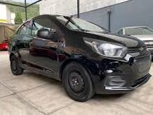 Roban automóvil de plataforma con todo y chofer.